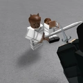A model of Sir Crusian protecting Queen Thea from a wizard cultist